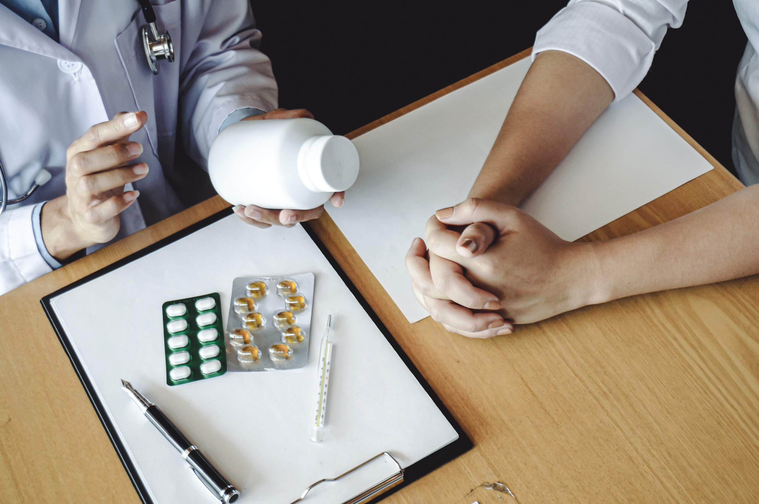 Health doctor reading the health benefits of nootropics