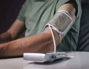 an adult getting checked for the connection of low magnesium and blood pressure levels