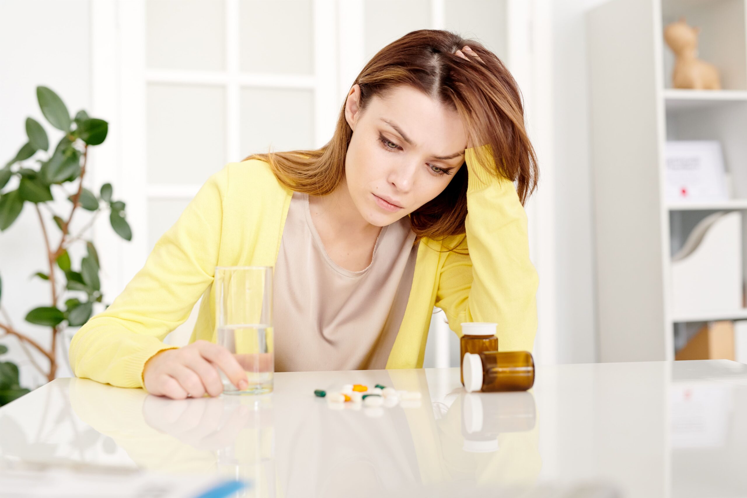 a girl experiencing depression symptoms not knowing that she has vitamin deficiency that may impact it