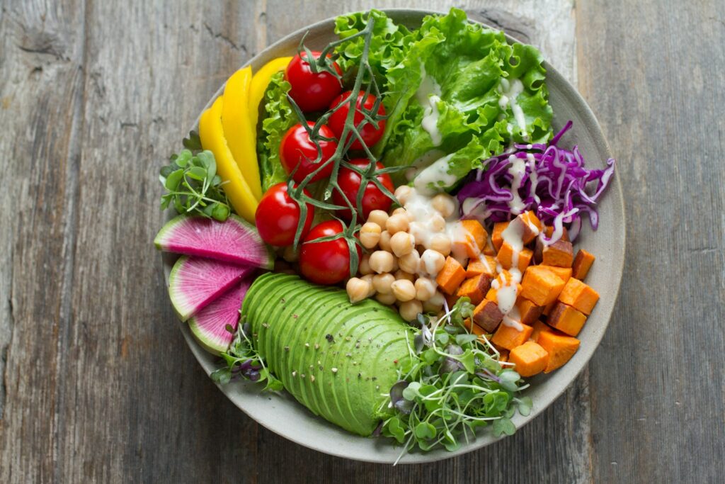 bowl of vegetable salads with avocados for vegans