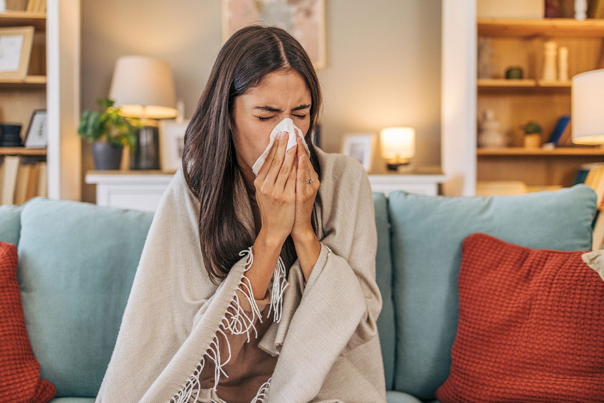woman sick and taking the probiotic called Korbiotic to help